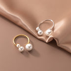 Bague ajustable avec trois perles d'eau douce
